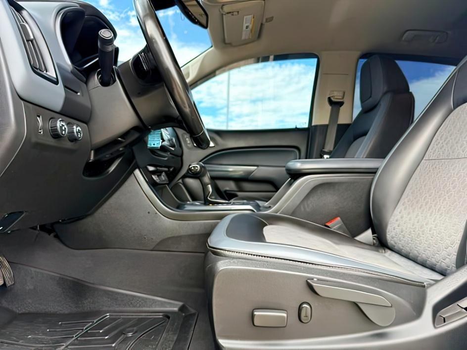 2019 WHITE /LEATHER Chevrolet Colorado (1GCGTDEN9K1) with an 36 V6 engine, Automatic transmission, located at 1175 N Woodruff Ave, Idaho Falls, ID, 83401, 43.506901, -111.999657 - Midsize truck utility and everyday versatility come together in this 2019 Chevrolet Colorado Z71 4x4, equipped with a 3.6L V6 engine and off road focused Z71 setup. Four wheel drive capability adds confidence on changing road conditions while maintaining the manageable size drivers want for daily co- Photo#13