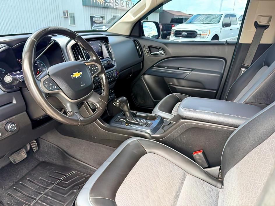 2019 WHITE /LEATHER Chevrolet Colorado (1GCGTDEN9K1) with an 36 V6 engine, Automatic transmission, located at 1175 N Woodruff Ave, Idaho Falls, ID, 83401, 43.506901, -111.999657 - Midsize truck utility and everyday versatility come together in this 2019 Chevrolet Colorado Z71 4x4, equipped with a 3.6L V6 engine and off road focused Z71 setup. Four wheel drive capability adds confidence on changing road conditions while maintaining the manageable size drivers want for daily co- Photo#14