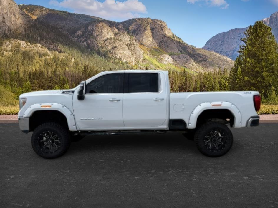 2022 WHITE /Jet Black GMC Sierra 2500HD SLT Crew Cab 4WD (1GT49NE77NF) with an 6.6L V8 OHV 16V engine, 6-Speed Automatic transmission, located at 1235 N Woodruff Ave., Idaho Falls, 83401, (208) 523-1053, 43.507172, -112.000488 - At Timberline Auto, finding a great deal on your next vehicle is always easy! Our experienced sales staff goal is to help find you the right vehicle at the right price! Our knowledgeable finance department has options for almost any credit score. We offer extended service contract options to prot - Photo#1