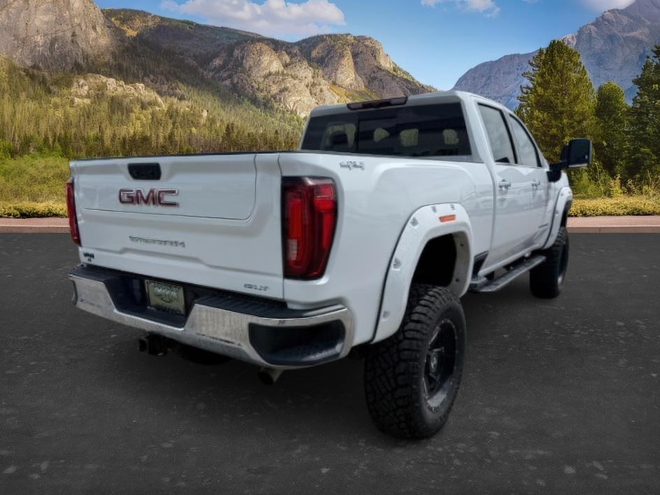 2022 WHITE /Jet Black GMC Sierra 2500HD SLT Crew Cab 4WD (1GT49NE77NF) with an 6.6L V8 OHV 16V engine, 6-Speed Automatic transmission, located at 1235 N Woodruff Ave., Idaho Falls, 83401, (208) 523-1053, 43.507172, -112.000488 - At Timberline Auto, finding a great deal on your next vehicle is always easy! Our experienced sales staff goal is to help find you the right vehicle at the right price! Our knowledgeable finance department has options for almost any credit score. We offer extended service contract options to prot - Photo#7