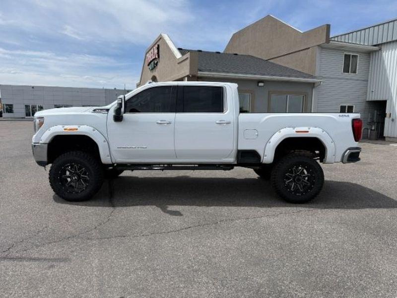 2022 WHITE /Jet Black GMC Sierra SLT (1GT49NE77NF) with an V8, 6.6L engine, 6-Speed Automatic transmission, located at 1175 N Woodruff Ave, Idaho Falls, ID, 83401, 43.506901, -111.999657 - <b>Vehicle Details</b><br>Take on tough jobs and weekend adventures with confidence in this **pre-owned 2022 GMC Sierra 2500 SLT 4WD**. With just **39,314 miles**, this powerful heavy-duty pickup is built to deliver the strength, comfort, and capability drivers want in a premium truck. Under the hoo- Photo#1