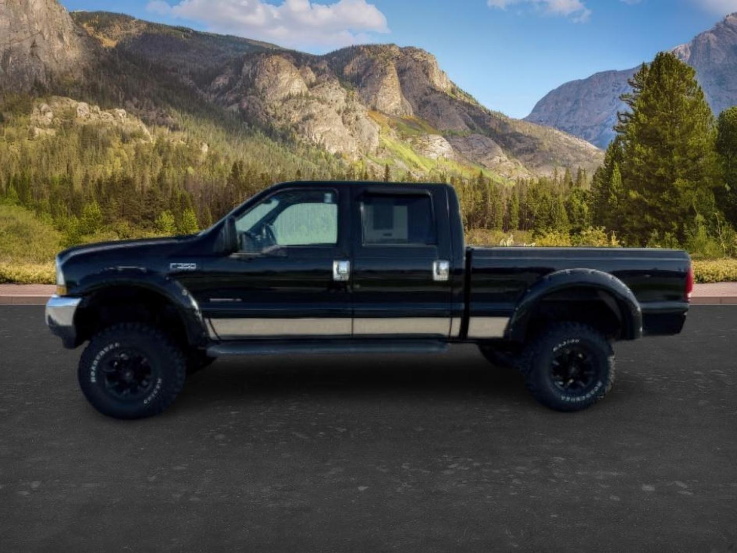 2002 BLACK /Medium Flint Ford F-350 (1FTSW31F32E) with an Powerstroke 73L V-8 diesel direct injection engine, Automatic transmission, located at 1175 N Woodruff Ave, Idaho Falls, ID, 83401, 43.506901, -111.999657 - At Timberline Auto, finding a great deal on your next vehicle is always easy! Our experienced sales staff goal is to help find you the right vehicle at the right price! Our knowledgeable finance department has options for almost any credit score. We offer extended service contract options to prot - Photo#0