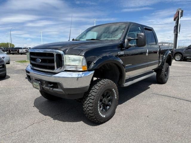 2002 BLACK /Medium Flint Ford F-350 LARIAT (1FTSW31F32E) with an Powerstroke 7.3L V-8 diesel direct injection engine, AUTOMATIC transmission, located at 1235 N Woodruff Ave., Idaho Falls, 83401, (208) 523-1053, 43.507172, -112.000488 - At Timberline Auto, finding a great deal on your next vehicle is always easy! Our experienced sales staff goal is to help find you the right vehicle at the right price! Our knowledgeable finance department has options for almost any credit score. We offer extended service contract options to prot - Photo#24