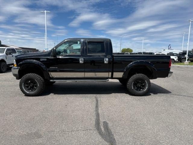 2002 BLACK /Medium Flint Ford F-350 LARIAT (1FTSW31F32E) with an Powerstroke 7.3L V-8 diesel direct injection engine, AUTOMATIC transmission, located at 1235 N Woodruff Ave., Idaho Falls, 83401, (208) 523-1053, 43.507172, -112.000488 - At Timberline Auto, finding a great deal on your next vehicle is always easy! Our experienced sales staff goal is to help find you the right vehicle at the right price! Our knowledgeable finance department has options for almost any credit score. We offer extended service contract options to prot - Photo#25
