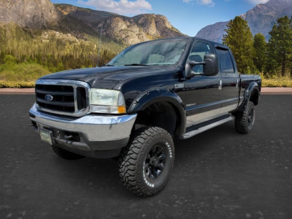2002 BLACK /Medium Flint Ford F-350 LARIAT (1FTSW31F32E) with an Powerstroke 7.3L V-8 diesel direct injection engine, AUTOMATIC transmission, located at 1235 N Woodruff Ave., Idaho Falls, 83401, (208) 523-1053, 43.507172, -112.000488 - At Timberline Auto, finding a great deal on your next vehicle is always easy! Our experienced sales staff goal is to help find you the right vehicle at the right price! Our knowledgeable finance department has options for almost any credit score. We offer extended service contract options to prot - Photo#0