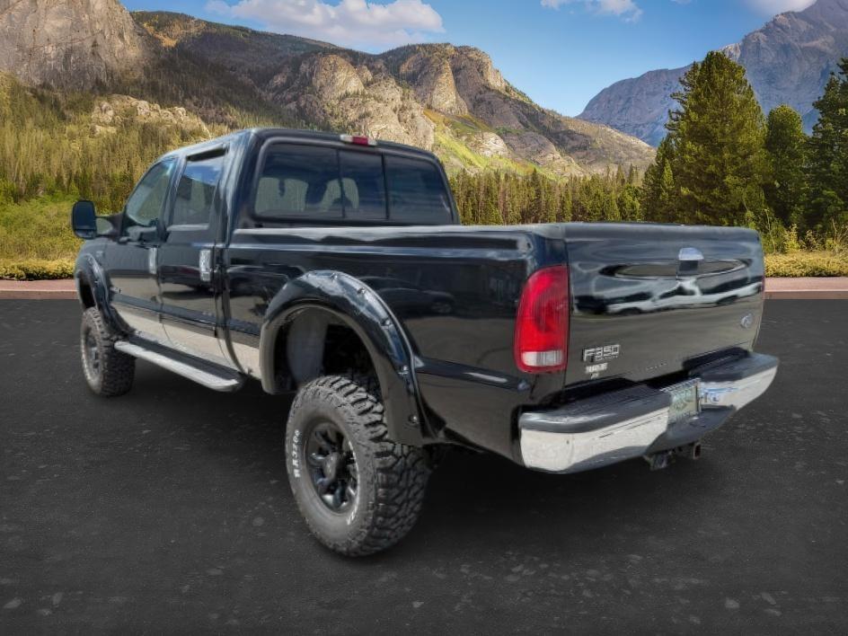 2002 BLACK /Medium Flint Ford F-350 LARIAT (1FTSW31F32E) with an Powerstroke 7.3L V-8 diesel direct injection engine, AUTOMATIC transmission, located at 1235 N Woodruff Ave., Idaho Falls, 83401, (208) 523-1053, 43.507172, -112.000488 - At Timberline Auto, finding a great deal on your next vehicle is always easy! Our experienced sales staff goal is to help find you the right vehicle at the right price! Our knowledgeable finance department has options for almost any credit score. We offer extended service contract options to prot - Photo#2