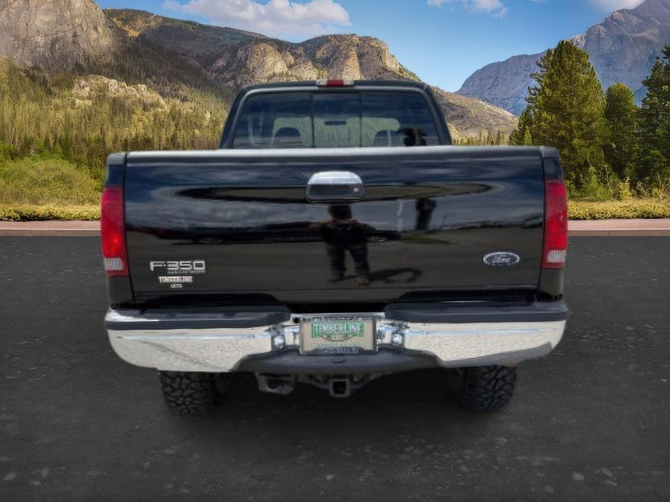 2002 BLACK /Medium Flint Ford F-350 LARIAT (1FTSW31F32E) with an Powerstroke 7.3L V-8 diesel direct injection engine, AUTOMATIC transmission, located at 1235 N Woodruff Ave., Idaho Falls, 83401, (208) 523-1053, 43.507172, -112.000488 - At Timberline Auto, finding a great deal on your next vehicle is always easy! Our experienced sales staff goal is to help find you the right vehicle at the right price! Our knowledgeable finance department has options for almost any credit score. We offer extended service contract options to prot - Photo#3