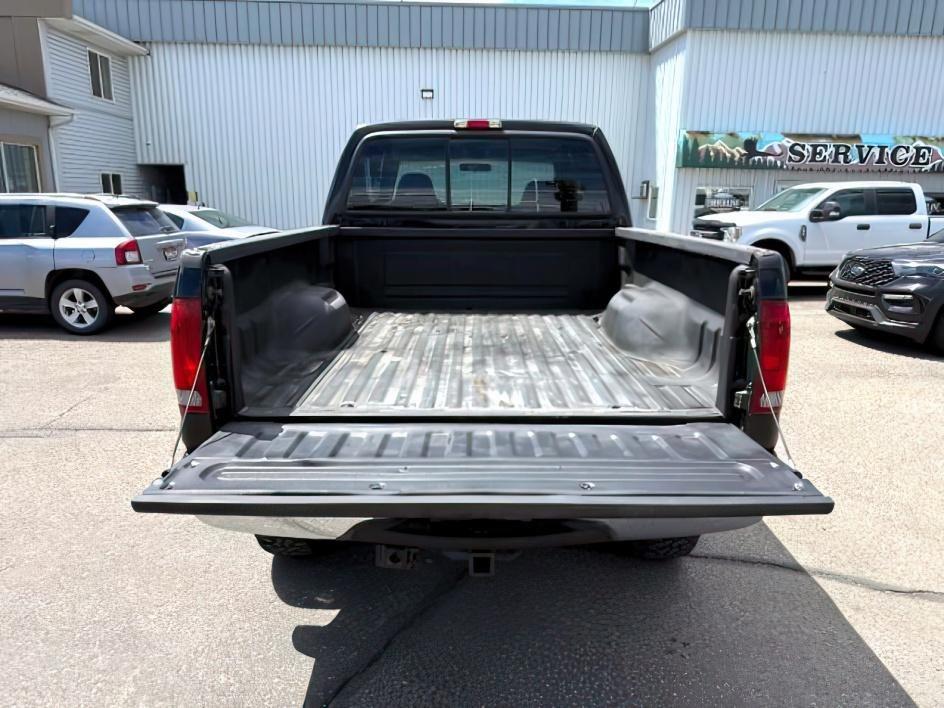 2002 BLACK /Medium Flint Ford F-350 LARIAT (1FTSW31F32E) with an Powerstroke 7.3L V-8 diesel direct injection engine, AUTOMATIC transmission, located at 1235 N Woodruff Ave., Idaho Falls, 83401, (208) 523-1053, 43.507172, -112.000488 - At Timberline Auto, finding a great deal on your next vehicle is always easy! Our experienced sales staff goal is to help find you the right vehicle at the right price! Our knowledgeable finance department has options for almost any credit score. We offer extended service contract options to prot - Photo#4