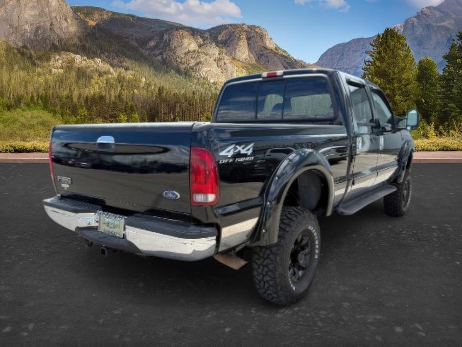 2002 BLACK /Medium Flint Ford F-350 LARIAT (1FTSW31F32E) with an Powerstroke 7.3L V-8 diesel direct injection engine, AUTOMATIC transmission, located at 1235 N Woodruff Ave., Idaho Falls, 83401, (208) 523-1053, 43.507172, -112.000488 - At Timberline Auto, finding a great deal on your next vehicle is always easy! Our experienced sales staff goal is to help find you the right vehicle at the right price! Our knowledgeable finance department has options for almost any credit score. We offer extended service contract options to prot - Photo#5