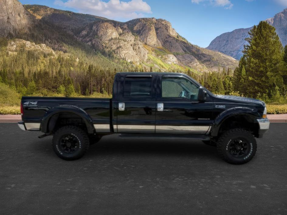2002 BLACK /Medium Flint Ford F-350 LARIAT (1FTSW31F32E) with an Powerstroke 7.3L V-8 diesel direct injection engine, AUTOMATIC transmission, located at 1235 N Woodruff Ave., Idaho Falls, 83401, (208) 523-1053, 43.507172, -112.000488 - At Timberline Auto, finding a great deal on your next vehicle is always easy! Our experienced sales staff goal is to help find you the right vehicle at the right price! Our knowledgeable finance department has options for almost any credit score. We offer extended service contract options to prot - Photo#6