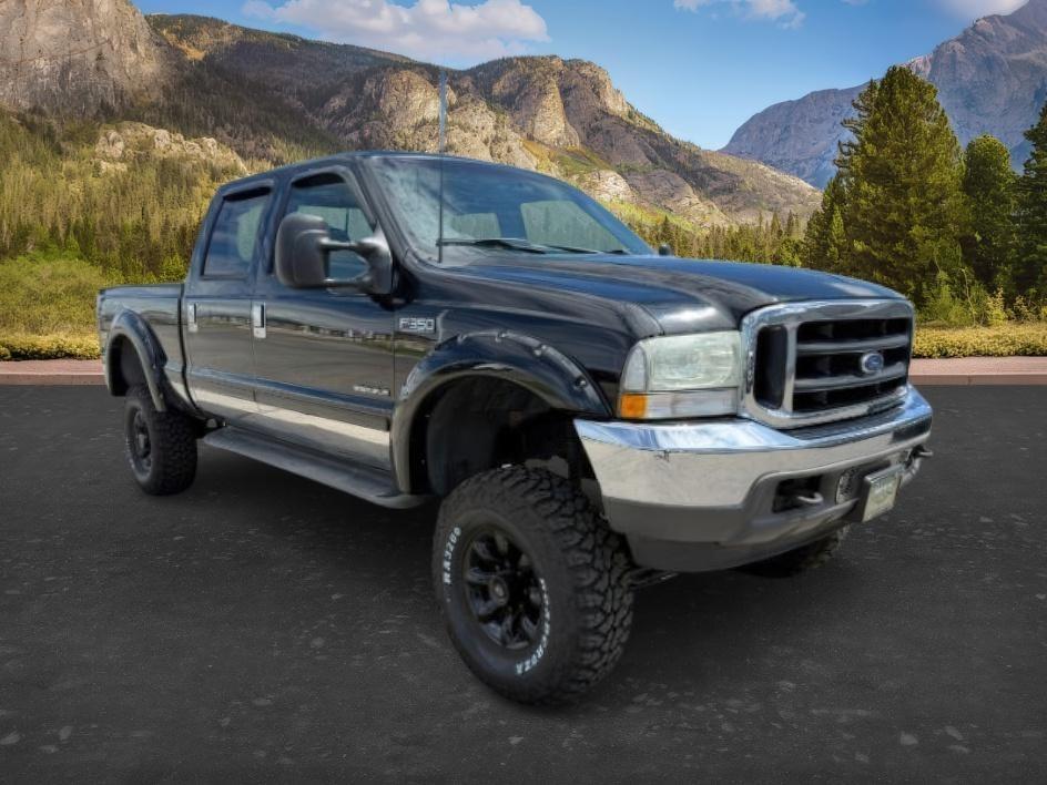 2002 BLACK /Medium Flint Ford F-350 LARIAT (1FTSW31F32E) with an Powerstroke 7.3L V-8 diesel direct injection engine, AUTOMATIC transmission, located at 1235 N Woodruff Ave., Idaho Falls, 83401, (208) 523-1053, 43.507172, -112.000488 - At Timberline Auto, finding a great deal on your next vehicle is always easy! Our experienced sales staff goal is to help find you the right vehicle at the right price! Our knowledgeable finance department has options for almost any credit score. We offer extended service contract options to prot - Photo#7
