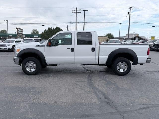 2015 WHITE /CLOTH Ford F-250 (1FT7W2B60FE) with an 62 V8 engine, Automatic transmission, located at 1175 N Woodruff Ave, Idaho Falls, ID, 83401, 43.506901, -111.999657 - This 2015 Ford F-250 Super Duty Crew Cab 4x4 is powered by a 6.2L V8 gas engine built for towing, hauling, and heavy duty use. The 3/4 ton platform gives it the strength needed for trailers, equipment, and demanding workloads while still keeping a usable crew cab layout for passengers. Four wheel dr- Photo#25