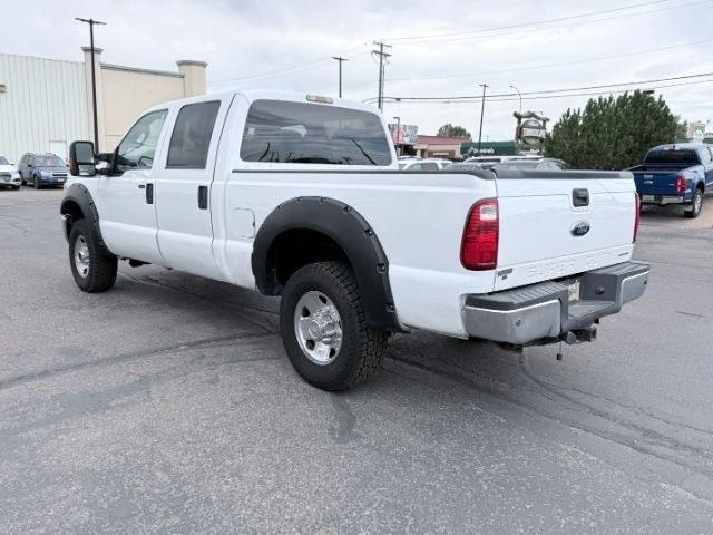 2015 WHITE /CLOTH Ford F-250 (1FT7W2B60FE) with an 62 V8 engine, Automatic transmission, located at 1175 N Woodruff Ave, Idaho Falls, ID, 83401, 43.506901, -111.999657 - This 2015 Ford F-250 Super Duty Crew Cab 4x4 is powered by a 6.2L V8 gas engine built for towing, hauling, and heavy duty use. The 3/4 ton platform gives it the strength needed for trailers, equipment, and demanding workloads while still keeping a usable crew cab layout for passengers. Four wheel dr- Photo#26