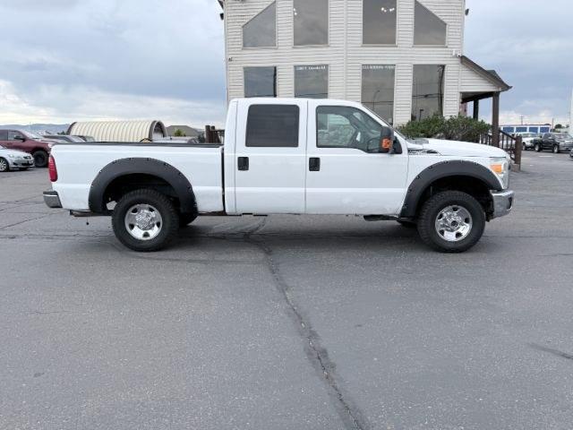 2015 WHITE /CLOTH Ford F-250 (1FT7W2B60FE) with an 62 V8 engine, Automatic transmission, located at 1175 N Woodruff Ave, Idaho Falls, ID, 83401, 43.506901, -111.999657 - This 2015 Ford F-250 Super Duty Crew Cab 4x4 is powered by a 6.2L V8 gas engine built for towing, hauling, and heavy duty use. The 3/4 ton platform gives it the strength needed for trailers, equipment, and demanding workloads while still keeping a usable crew cab layout for passengers. Four wheel dr- Photo#29