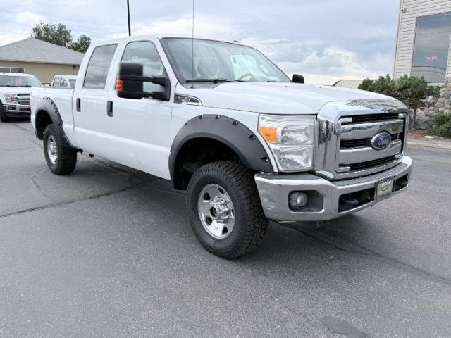 2015 WHITE /CLOTH Ford F-250 (1FT7W2B60FE) with an 62 V8 engine, Automatic transmission, located at 1175 N Woodruff Ave, Idaho Falls, ID, 83401, 43.506901, -111.999657 - This 2015 Ford F-250 Super Duty Crew Cab 4x4 is powered by a 6.2L V8 gas engine built for towing, hauling, and heavy duty use. The 3/4 ton platform gives it the strength needed for trailers, equipment, and demanding workloads while still keeping a usable crew cab layout for passengers. Four wheel dr- Photo#30