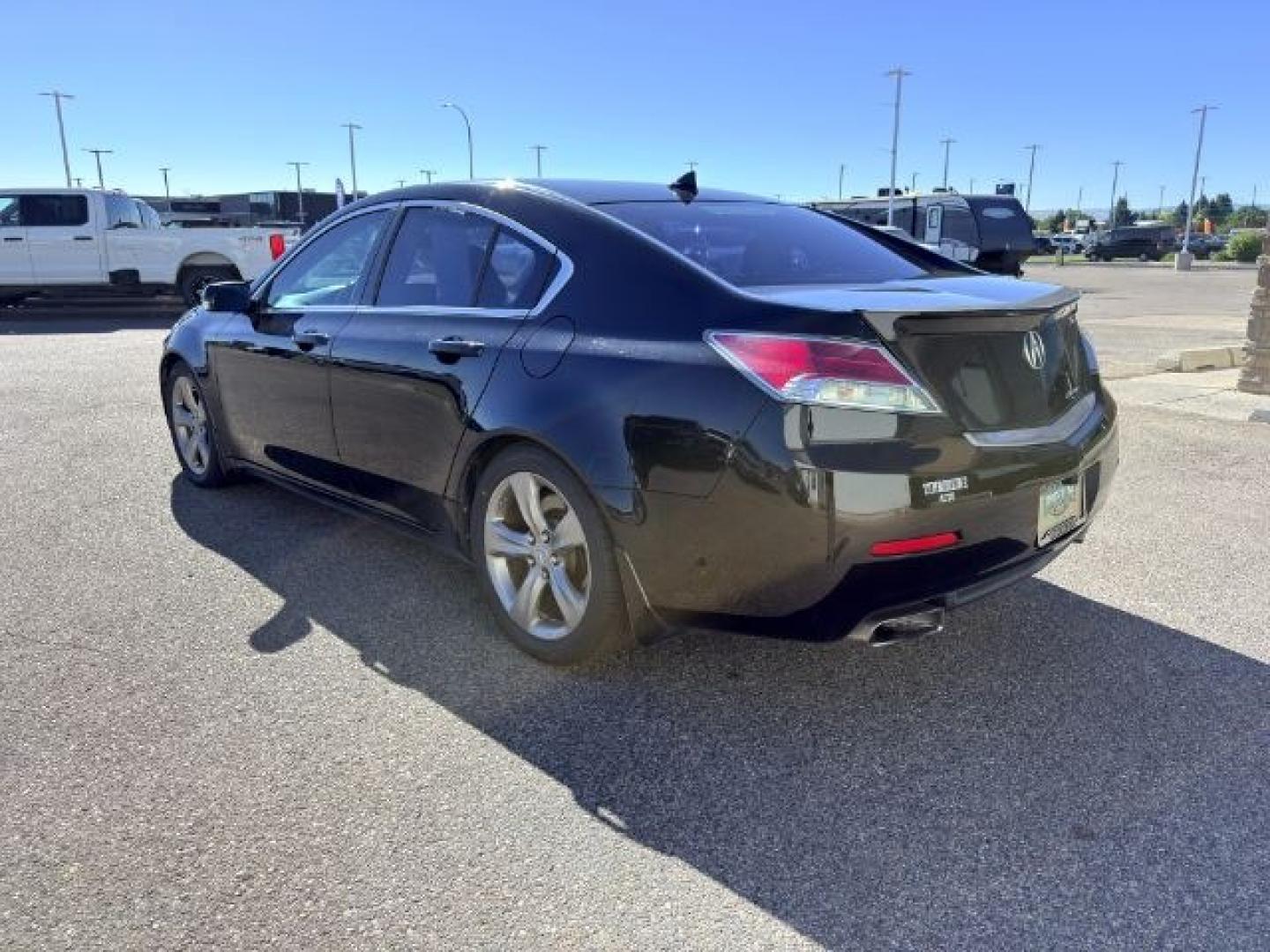 2013 BLACK /Ebony Acura TL (19UUA9F59DA) with an 37L V-6 VTEC variable valve control engine, Automatic transmission, located at 1175 N Woodruff Ave, Idaho Falls, ID, 83401, 43.506901, -111.999657 - Whether it's the daily commute, weekend errands, or a road trip with the family, this 2013 Acura TL offers the comfort and refinement that make every drive more enjoyable. Powered by a smooth 3.5L V6 engine and front-wheel drive, it provides confident performance while maintaining the premium feel A- Photo#2