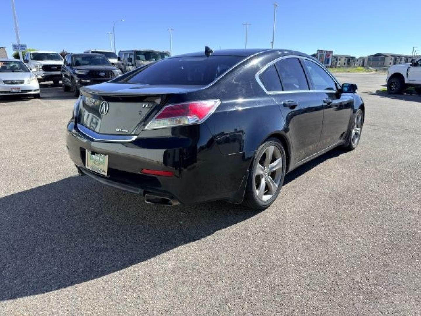 2013 BLACK /Ebony Acura TL (19UUA9F59DA) with an 37L V-6 VTEC variable valve control engine, Automatic transmission, located at 1175 N Woodruff Ave, Idaho Falls, ID, 83401, 43.506901, -111.999657 - Whether it's the daily commute, weekend errands, or a road trip with the family, this 2013 Acura TL offers the comfort and refinement that make every drive more enjoyable. Powered by a smooth 3.5L V6 engine and front-wheel drive, it provides confident performance while maintaining the premium feel A- Photo#4