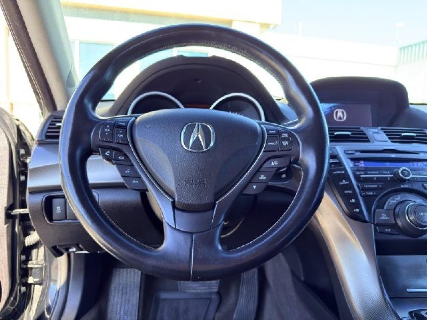 2013 BLACK /Ebony Acura TL (19UUA9F59DA) with an 37L V-6 VTEC variable valve control engine, Automatic transmission, located at 1175 N Woodruff Ave, Idaho Falls, ID, 83401, 43.506901, -111.999657 - Whether it's the daily commute, weekend errands, or a road trip with the family, this 2013 Acura TL offers the comfort and refinement that make every drive more enjoyable. Powered by a smooth 3.5L V6 engine and front-wheel drive, it provides confident performance while maintaining the premium feel A- Photo#13