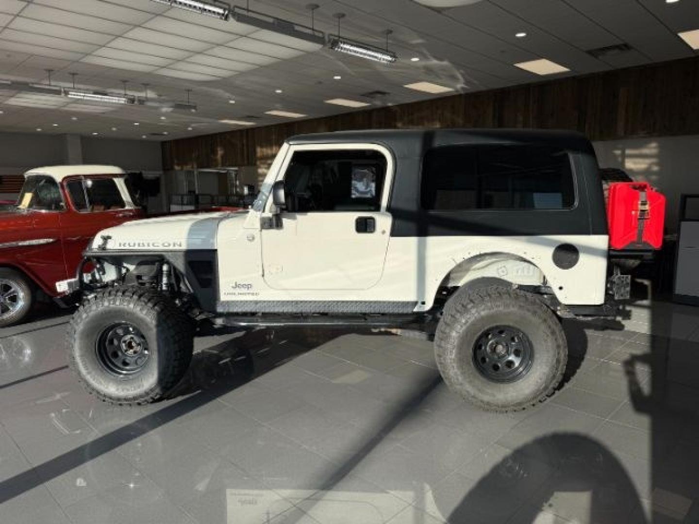 2005 WHITE /Dark Slate Gray Jeep Wrangler (1J4FA64S25P) with an Power Tech 4L I-6 regular unleaded engine, Manual transmission, located at 1175 N Woodruff Ave, Idaho Falls, ID, 83401, 43.506901, -111.999657 - At Timberline Auto, finding a great deal on your next vehicle is always easy! Our experienced sales staff goal is to help find you the right vehicle at the right price! Our knowledgeable finance department has options for almost any credit score. We offer extended service contract options to prot - Photo#21