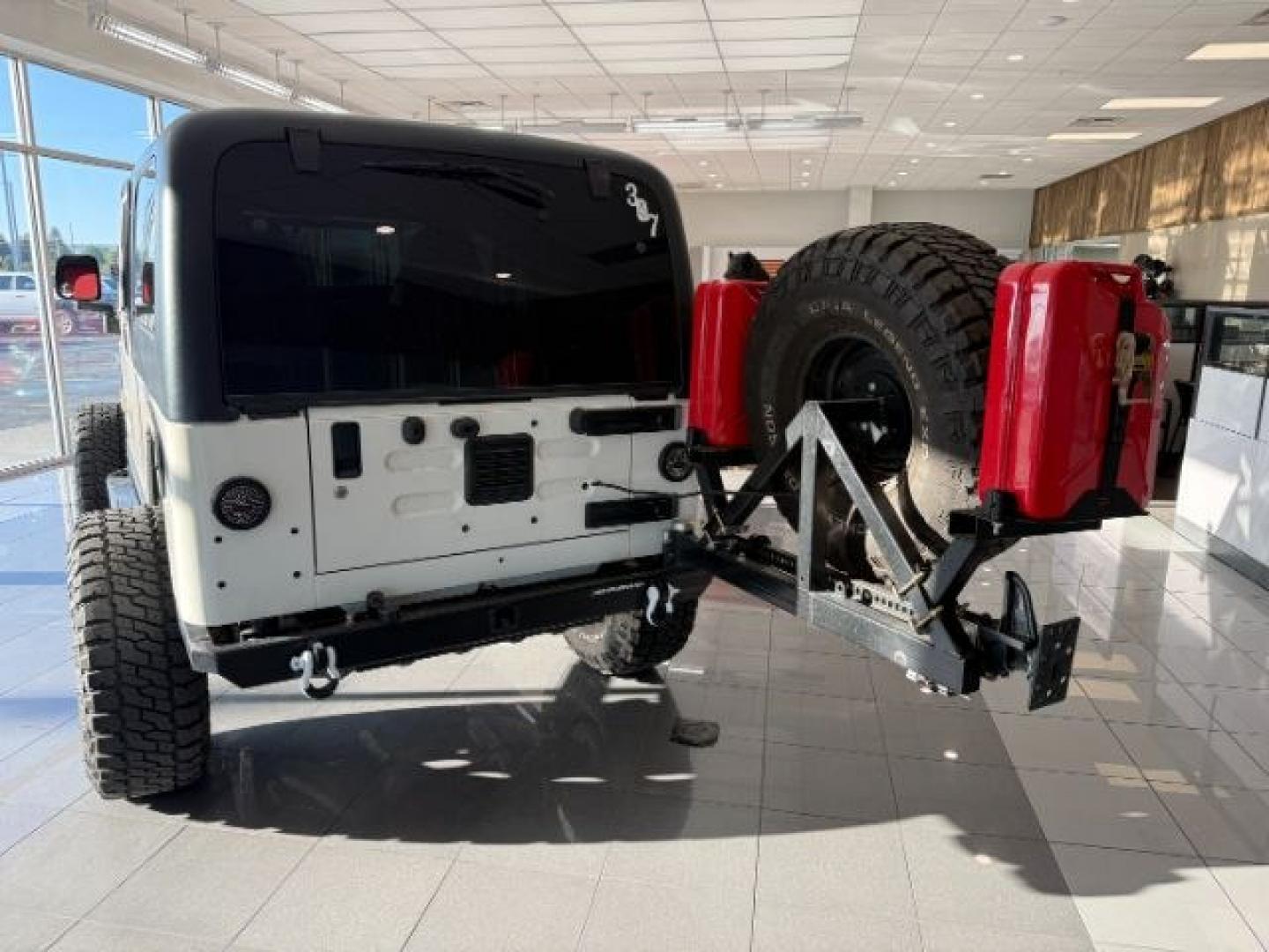 2005 WHITE /Dark Slate Gray Jeep Wrangler (1J4FA64S25P) with an Power Tech 4L I-6 regular unleaded engine, Manual transmission, located at 1175 N Woodruff Ave, Idaho Falls, ID, 83401, 43.506901, -111.999657 - At Timberline Auto, finding a great deal on your next vehicle is always easy! Our experienced sales staff goal is to help find you the right vehicle at the right price! Our knowledgeable finance department has options for almost any credit score. We offer extended service contract options to prot - Photo#24