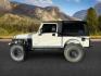 2005 WHITE /Dark Slate Gray Jeep Wrangler (1J4FA64S25P) with an Power Tech 4L I-6 regular unleaded engine, Manual transmission, located at 1175 N Woodruff Ave, Idaho Falls, ID, 83401, 43.506901, -111.999657 - At Timberline Auto, finding a great deal on your next vehicle is always easy! Our experienced sales staff goal is to help find you the right vehicle at the right price! Our knowledgeable finance department has options for almost any credit score. We offer extended service contract options to prot - Photo#1