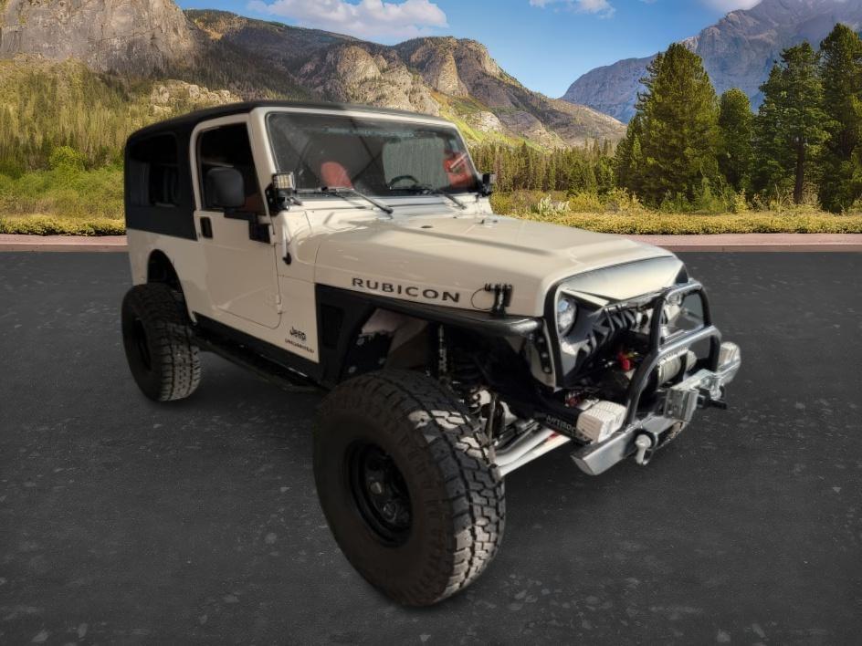 2005 WHITE /Dark Slate Gray Jeep Wrangler (1J4FA64S25P) with an Power Tech 4L I-6 regular unleaded engine, Manual transmission, located at 1175 N Woodruff Ave, Idaho Falls, ID, 83401, 43.506901, -111.999657 - This 2005 Jeep Wrangler is a purpose-built off-road rig designed for capability, durability, and adventure-ready performance. Built on the iconic Wrangler platform known for its trail-tested strength and removable-top freedom, it has been enhanced with a range of functional upgrades that elevate its - Photo#7