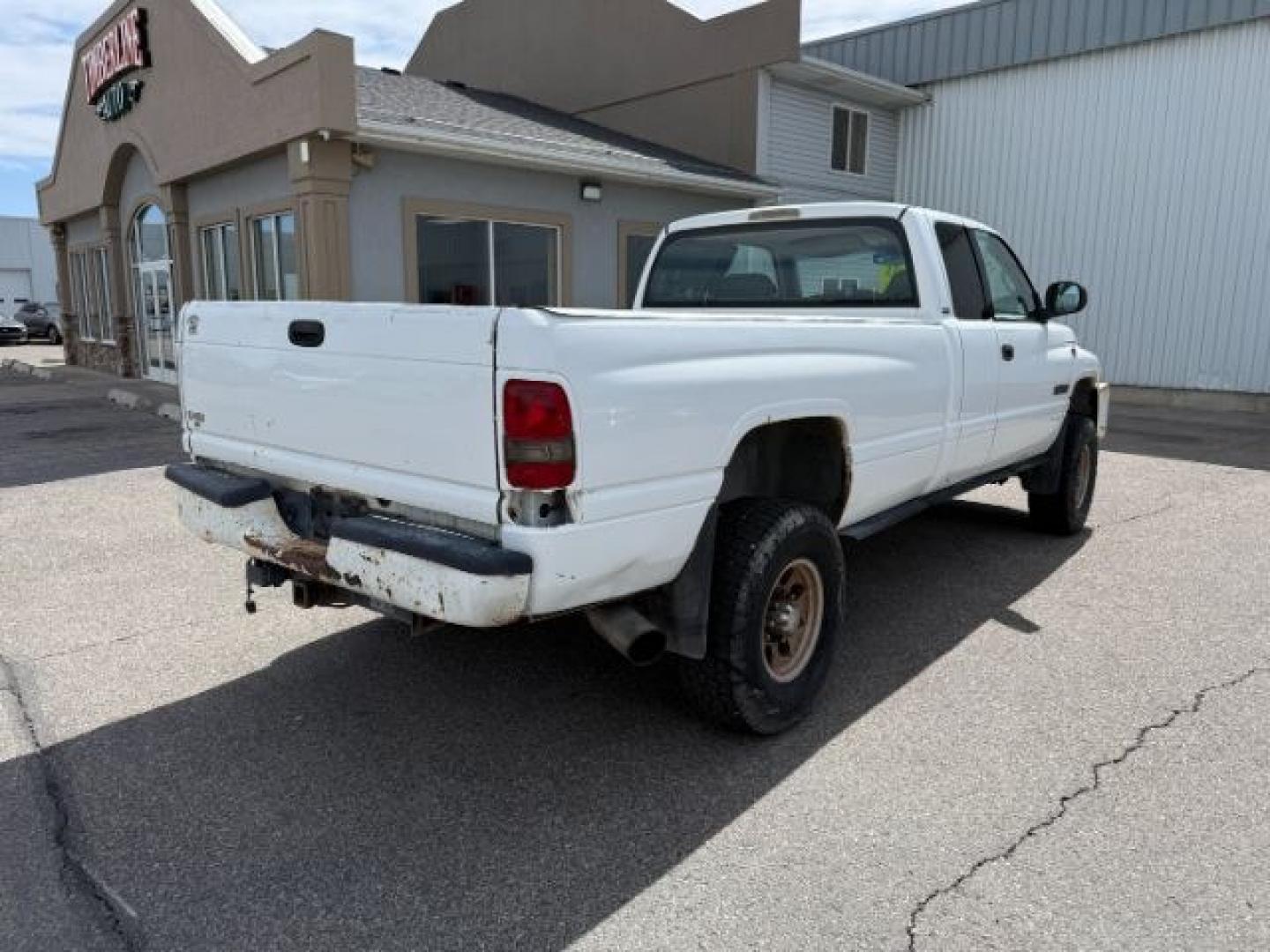2001 WHITE /Agate Dodge Ram 2500 (3B7KF23671G) with an Cummins 59L I-6 diesel direct injection engine, Automatic transmission, located at 1175 N Woodruff Ave, Idaho Falls, ID, 83401, 43.506901, -111.999657 - At Timberline Auto, finding a great deal on your next vehicle is always easy! Our experienced sales staff goal is to help find you the right vehicle at the right price! Our knowledgeable finance department has options for almost any credit score. We offer extended service contract options to prot - Photo#21