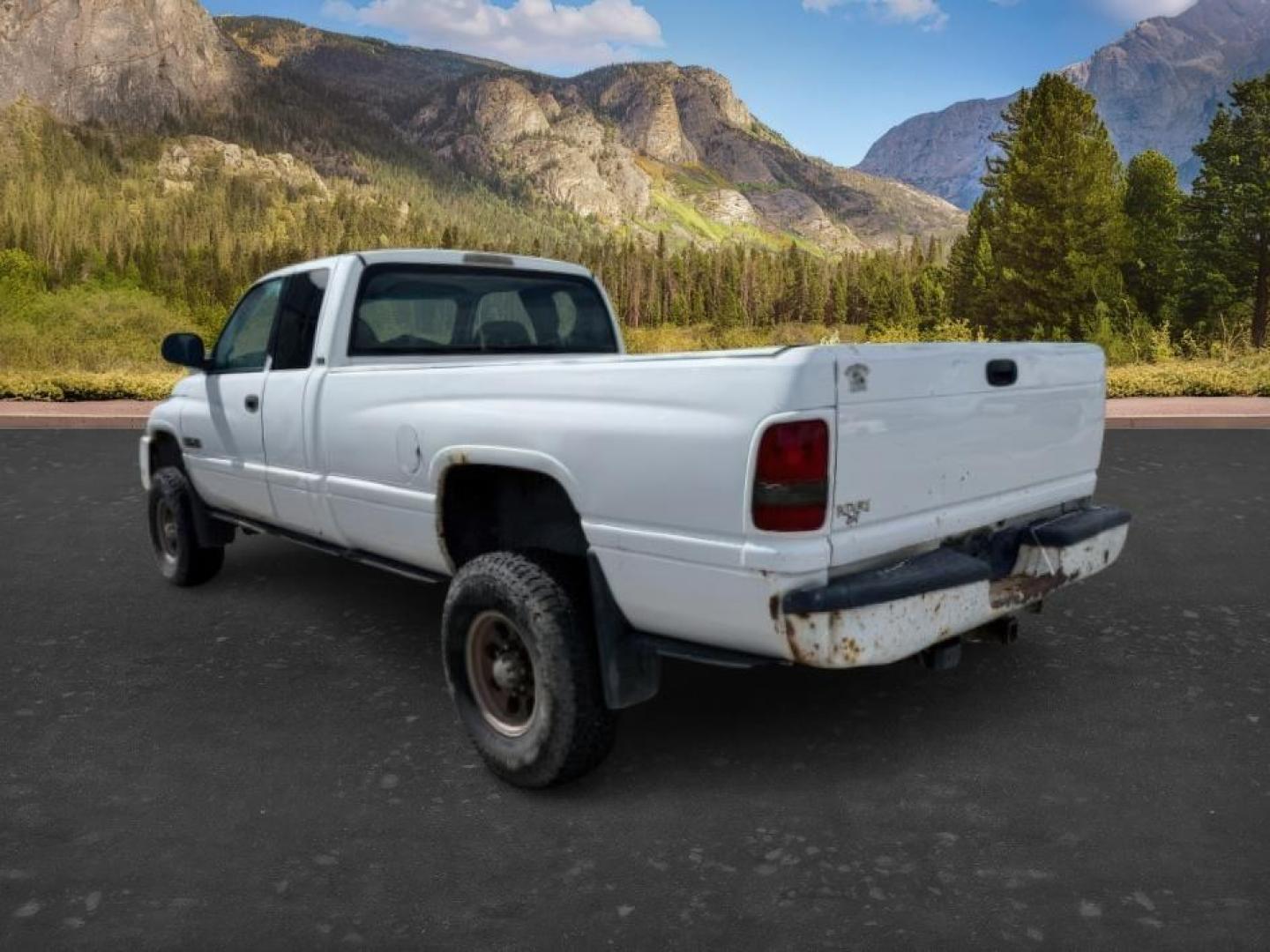 2001 WHITE /Agate Dodge Ram 2500 (3B7KF23671G) with an Cummins 59L I-6 diesel direct injection engine, Automatic transmission, located at 1175 N Woodruff Ave, Idaho Falls, ID, 83401, 43.506901, -111.999657 - At Timberline Auto, finding a great deal on your next vehicle is always easy! Our experienced sales staff goal is to help find you the right vehicle at the right price! Our knowledgeable finance department has options for almost any credit score. We offer extended service contract options to prot - Photo#2