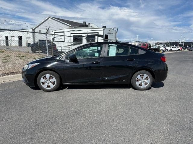 2016 BLACK /Jet Black Chevrolet Cruze (1G1BC5SM4G7) with an 14L I-4 gasoline direct injection engine, Automatic transmission, located at 1175 N Woodruff Ave, Idaho Falls, ID, 83401, 43.506901, -111.999657 - Efficient performance and everyday comfort come together in this 2016 Chevrolet Cruze. Powered by a responsive 1.4L turbocharged 4-cylinder engine and front-wheel drive, it offers an enjoyable driving experience while helping keep fuel costs down. The four-door sedan layout provides comfortable seat- Photo#1