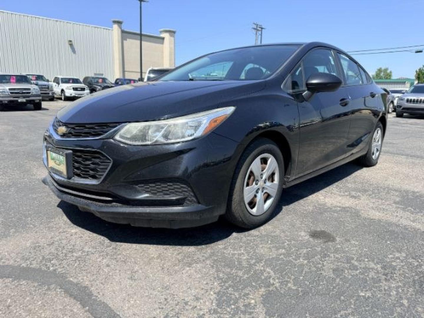 2016 BLACK /Jet Black Chevrolet Cruze (1G1BC5SM4G7) with an 14L I-4 gasoline direct injection engine, Automatic transmission, located at 1175 N Woodruff Ave, Idaho Falls, ID, 83401, 43.506901, -111.999657 - Efficient performance and everyday comfort come together in this 2016 Chevrolet Cruze. Powered by a responsive 1.4L turbocharged 4-cylinder engine and front-wheel drive, it offers an enjoyable driving experience while helping keep fuel costs down. The four-door sedan layout provides comfortable seat- Photo#21