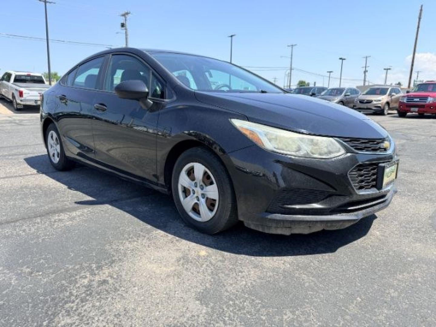 2016 BLACK /Jet Black Chevrolet Cruze (1G1BC5SM4G7) with an 14L I-4 gasoline direct injection engine, Automatic transmission, located at 1175 N Woodruff Ave, Idaho Falls, ID, 83401, 43.506901, -111.999657 - Efficient performance and everyday comfort come together in this 2016 Chevrolet Cruze. Powered by a responsive 1.4L turbocharged 4-cylinder engine and front-wheel drive, it offers an enjoyable driving experience while helping keep fuel costs down. The four-door sedan layout provides comfortable seat- Photo#28