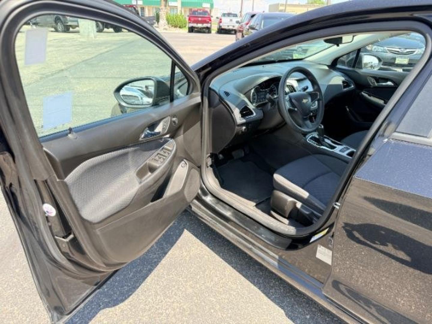 2016 BLACK /Jet Black Chevrolet Cruze (1G1BC5SM4G7) with an 14L I-4 gasoline direct injection engine, Automatic transmission, located at 1175 N Woodruff Ave, Idaho Falls, ID, 83401, 43.506901, -111.999657 - Efficient performance and everyday comfort come together in this 2016 Chevrolet Cruze. Powered by a responsive 1.4L turbocharged 4-cylinder engine and front-wheel drive, it offers an enjoyable driving experience while helping keep fuel costs down. The four-door sedan layout provides comfortable seat- Photo#31