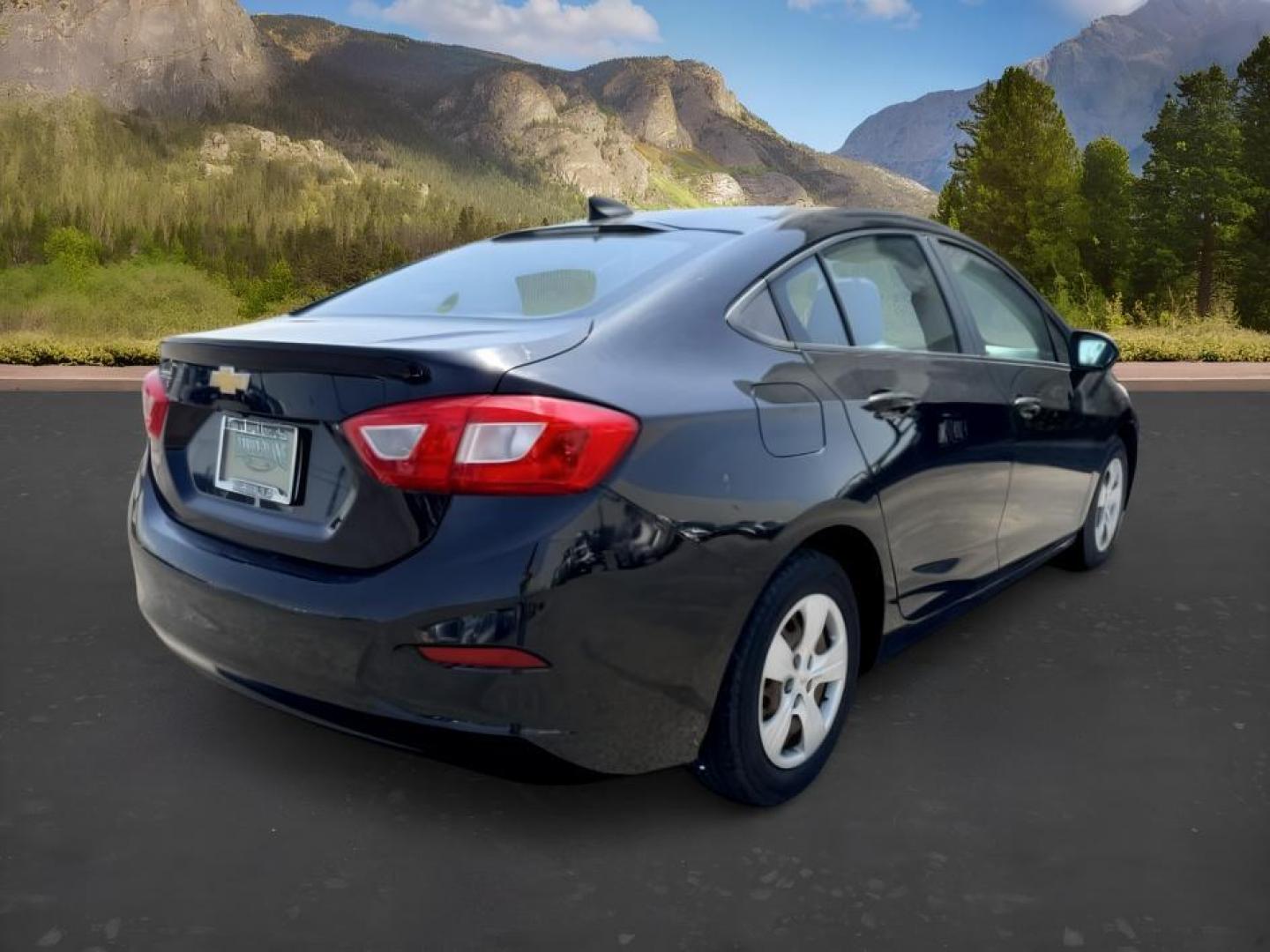 2016 BLACK /Jet Black Chevrolet Cruze (1G1BC5SM4G7) with an 14L I-4 gasoline direct injection engine, Automatic transmission, located at 1175 N Woodruff Ave, Idaho Falls, ID, 83401, 43.506901, -111.999657 - Efficient performance and everyday comfort come together in this 2016 Chevrolet Cruze. Powered by a responsive 1.4L turbocharged 4-cylinder engine and front-wheel drive, it offers an enjoyable driving experience while helping keep fuel costs down. The four-door sedan layout provides comfortable seat- Photo#5