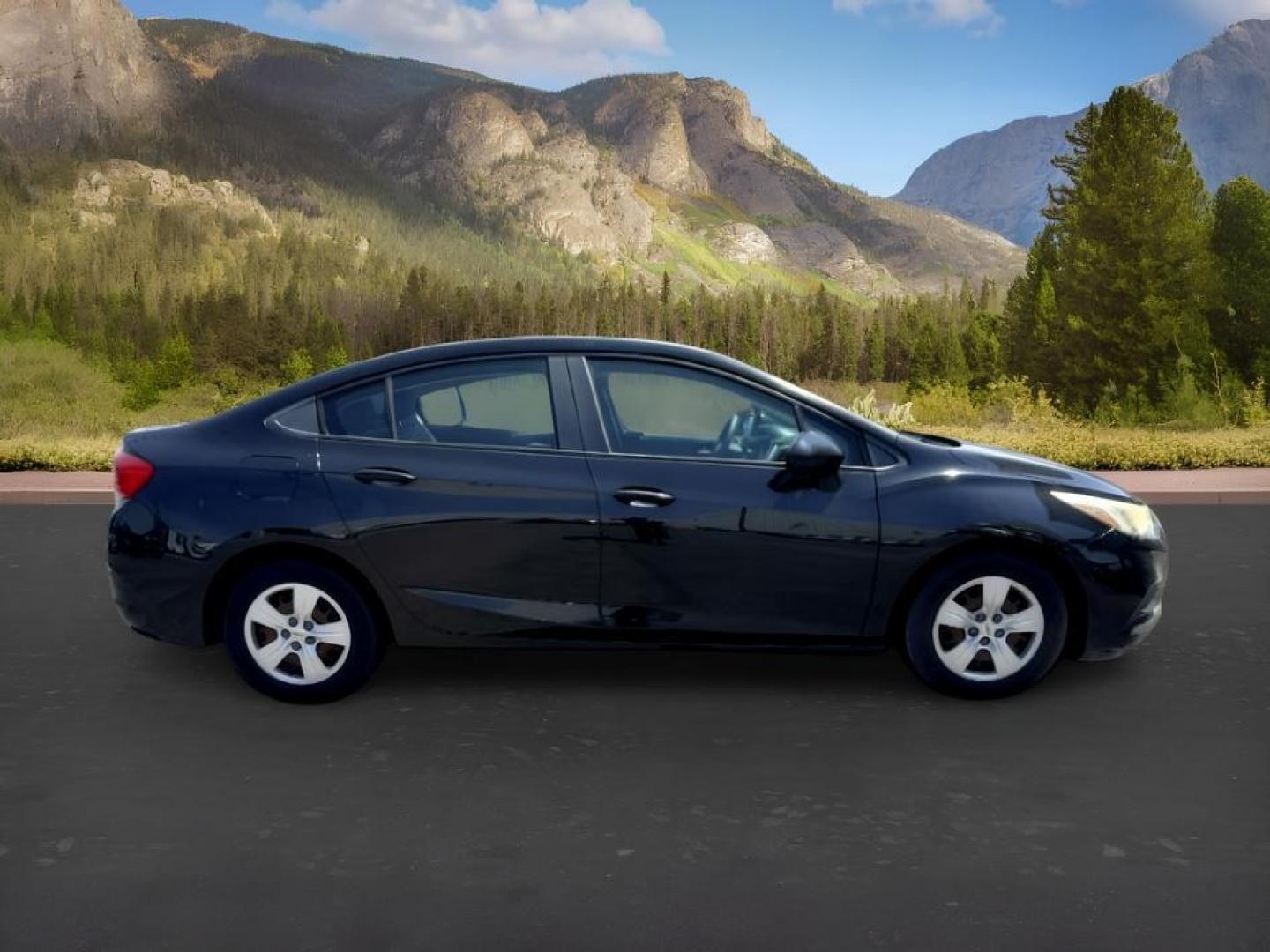 2016 BLACK /Jet Black Chevrolet Cruze (1G1BC5SM4G7) with an 14L I-4 gasoline direct injection engine, Automatic transmission, located at 1175 N Woodruff Ave, Idaho Falls, ID, 83401, 43.506901, -111.999657 - Efficient performance and everyday comfort come together in this 2016 Chevrolet Cruze. Powered by a responsive 1.4L turbocharged 4-cylinder engine and front-wheel drive, it offers an enjoyable driving experience while helping keep fuel costs down. The four-door sedan layout provides comfortable seat- Photo#6