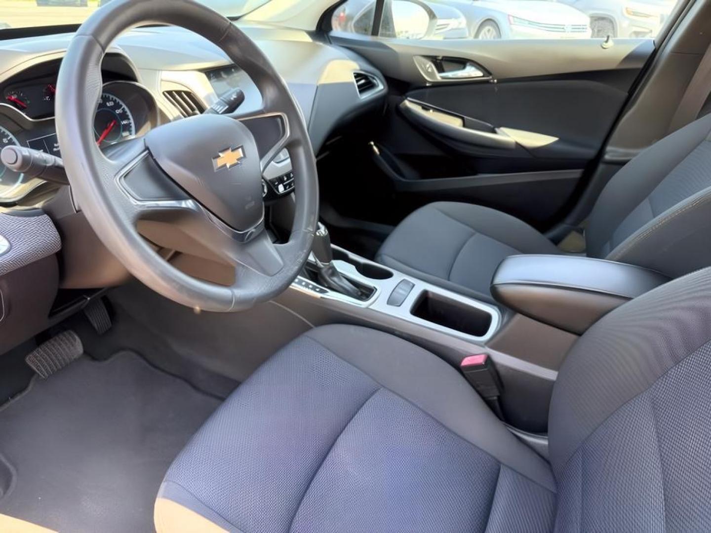 2016 BLACK /Jet Black Chevrolet Cruze (1G1BC5SM4G7) with an 14L I-4 gasoline direct injection engine, Automatic transmission, located at 1175 N Woodruff Ave, Idaho Falls, ID, 83401, 43.506901, -111.999657 - Efficient performance and everyday comfort come together in this 2016 Chevrolet Cruze. Powered by a responsive 1.4L turbocharged 4-cylinder engine and front-wheel drive, it offers an enjoyable driving experience while helping keep fuel costs down. The four-door sedan layout provides comfortable seat- Photo#12