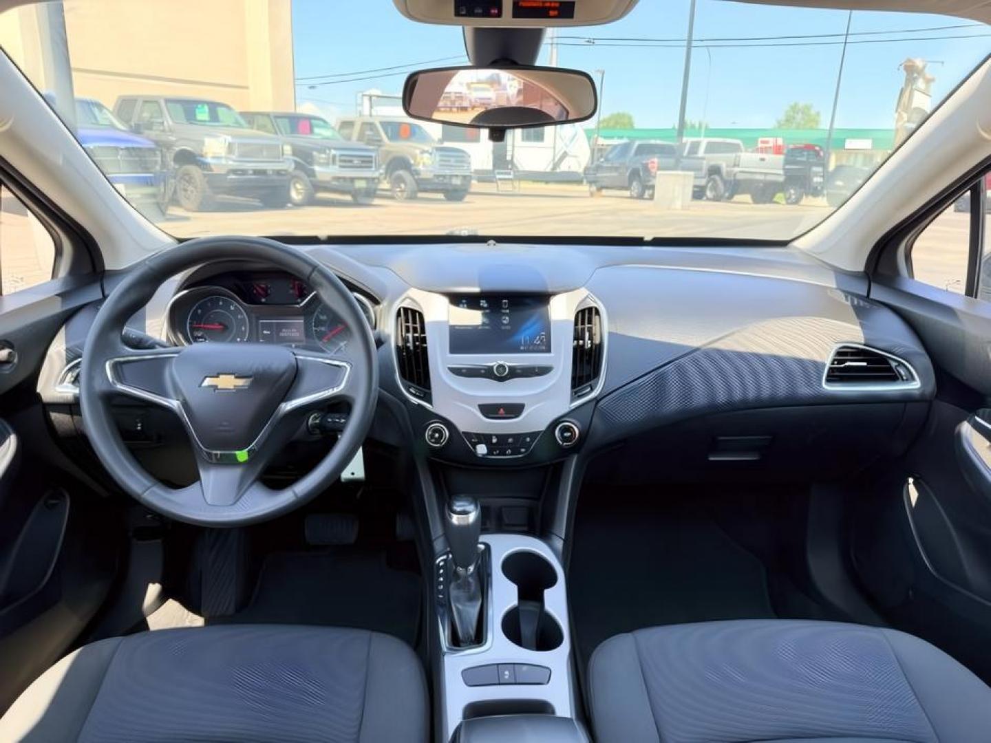 2016 BLACK /Jet Black Chevrolet Cruze (1G1BC5SM4G7) with an 14L I-4 gasoline direct injection engine, Automatic transmission, located at 1175 N Woodruff Ave, Idaho Falls, ID, 83401, 43.506901, -111.999657 - Efficient performance and everyday comfort come together in this 2016 Chevrolet Cruze. Powered by a responsive 1.4L turbocharged 4-cylinder engine and front-wheel drive, it offers an enjoyable driving experience while helping keep fuel costs down. The four-door sedan layout provides comfortable seat- Photo#18
