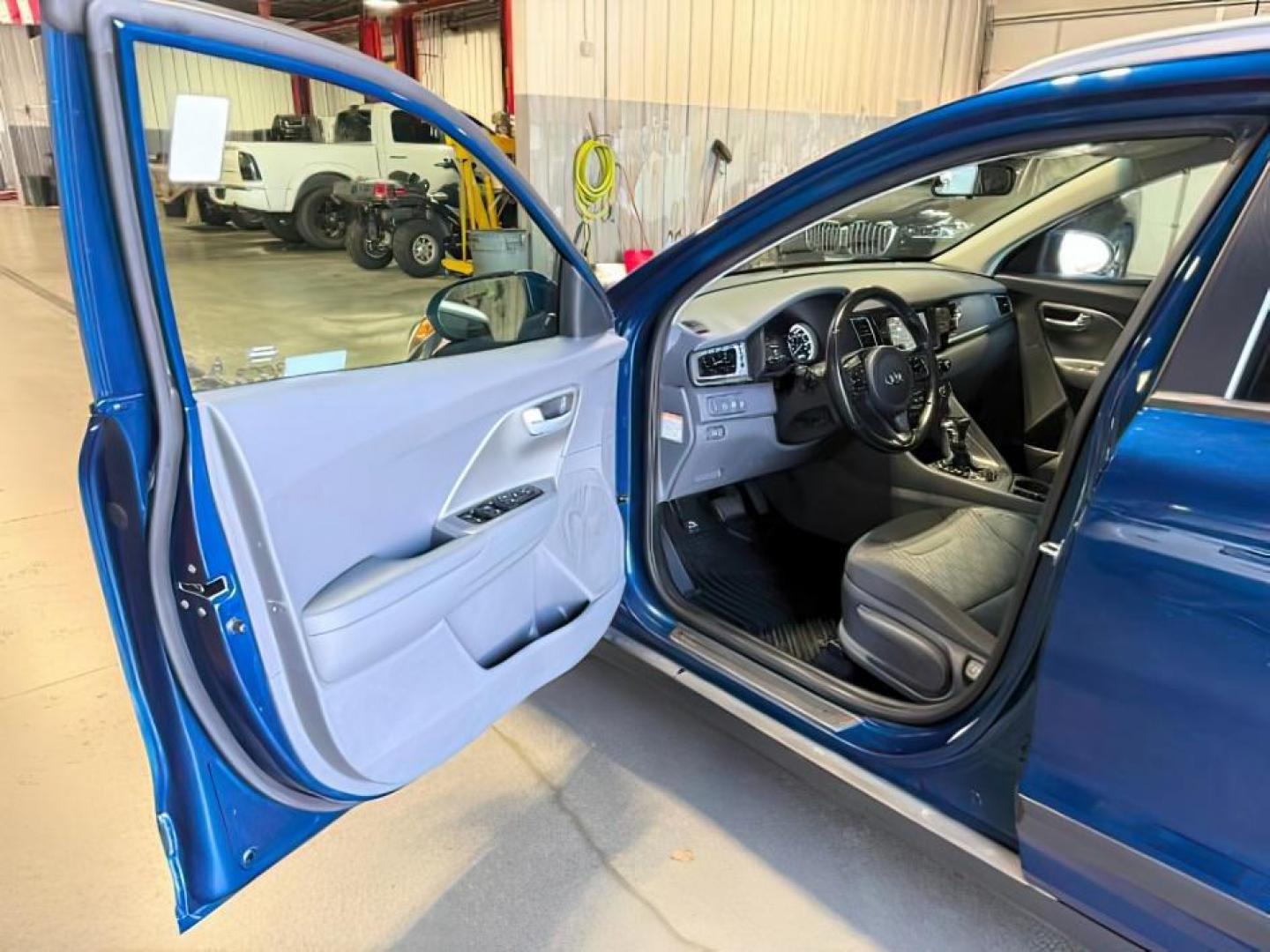 2019 BLUE /Gray KIA Niro (KNDCB3LC9K5) with an 16L I-4 gasoline direct injection engine, Automatic transmission, located at 1175 N Woodruff Ave, Idaho Falls, ID, 83401, 43.506901, -111.999657 - At Timberline Auto, finding a great deal on your next vehicle is always easy! Our experienced sales staff goal is to help find you the right vehicle at the right price! Our knowledgeable finance department has options for almost any credit score. We offer extended service contract options to prot - Photo#12