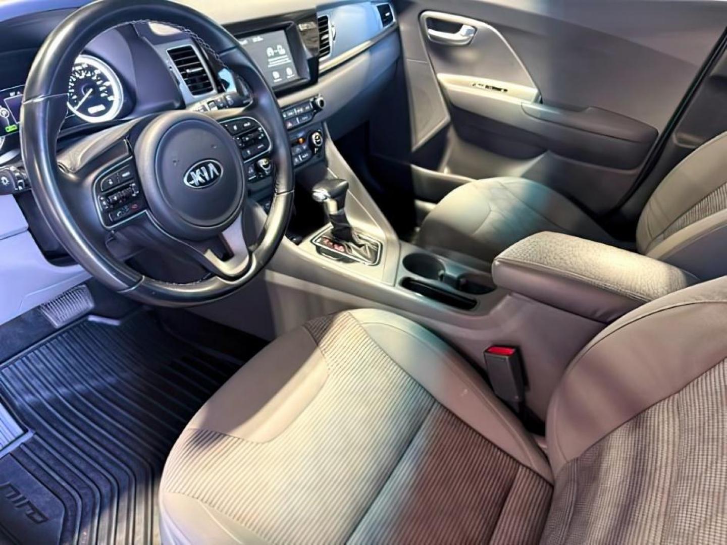 2019 BLUE /Gray KIA Niro (KNDCB3LC9K5) with an 16L I-4 gasoline direct injection engine, Automatic transmission, located at 1175 N Woodruff Ave, Idaho Falls, ID, 83401, 43.506901, -111.999657 - At Timberline Auto, finding a great deal on your next vehicle is always easy! Our experienced sales staff goal is to help find you the right vehicle at the right price! Our knowledgeable finance department has options for almost any credit score. We offer extended service contract options to prot - Photo#14