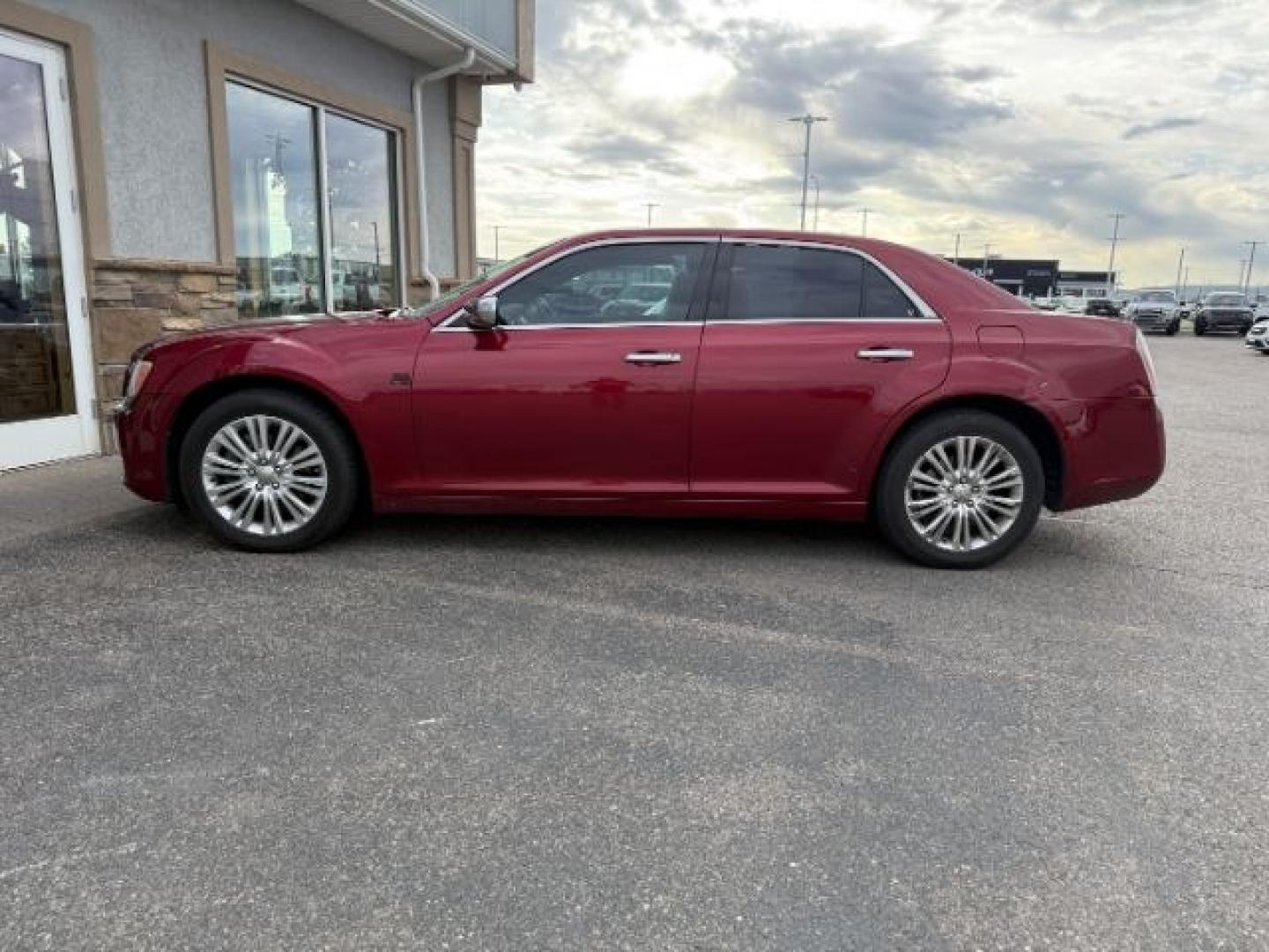 2014 RED /Black Chrysler 300C (2C3CCAKG7EH) with an HEMI 57L V-8 variable valve control engine, Automatic transmission, located at 1175 N Woodruff Ave, Idaho Falls, ID, 83401, 43.506901, -111.999657 - Photo#0