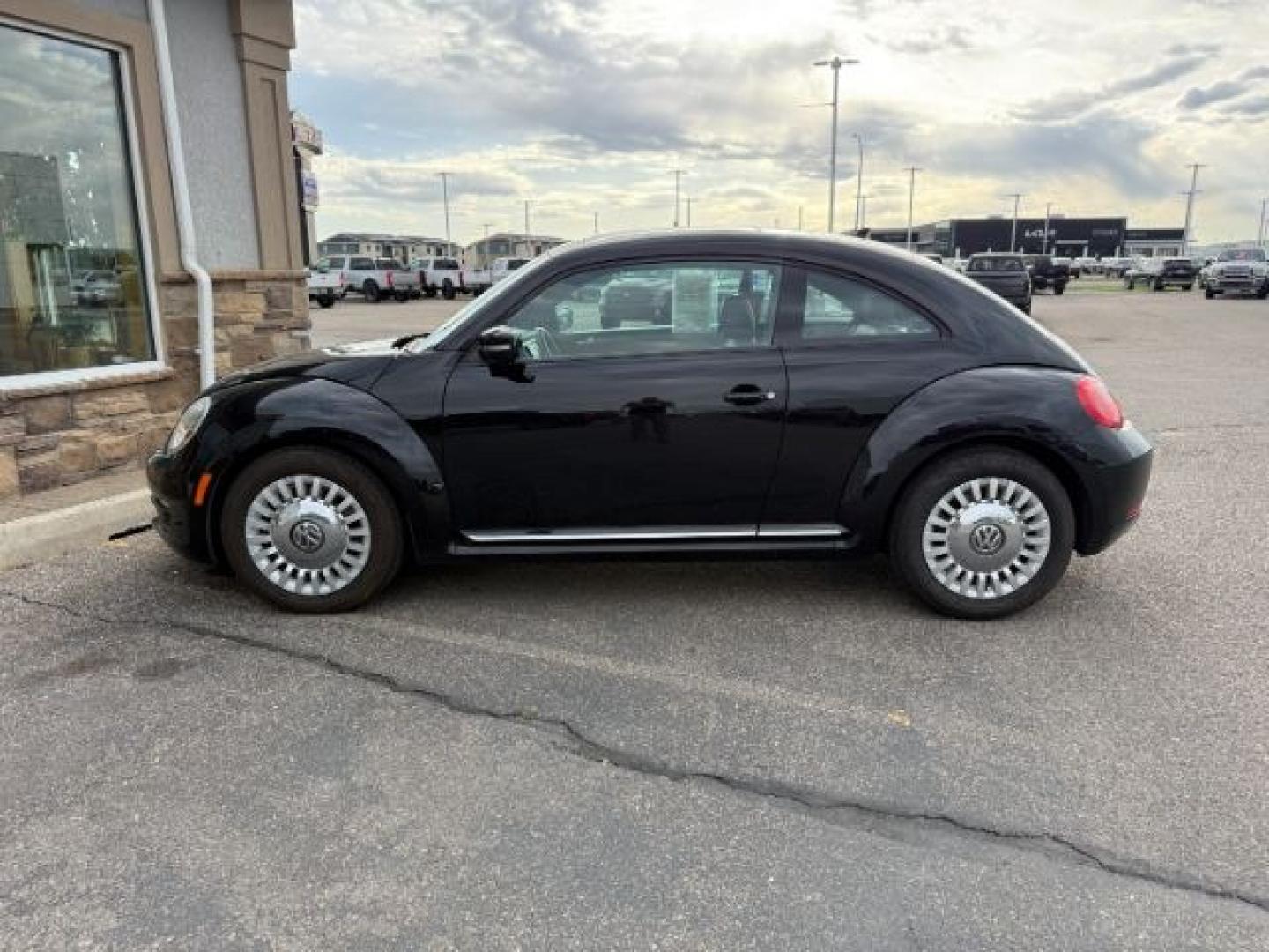 2014 BLACK /Titan Black Volkswagen Beetle 2.5L (3VWJX7AT9EM) with an 2.5L I-5 DOHC engine, AUTOMATIC transmission, located at 1235 N Woodruff Ave., Idaho Falls, 83401, (208) 523-1053, 43.507172, -112.000488 - Photo#0