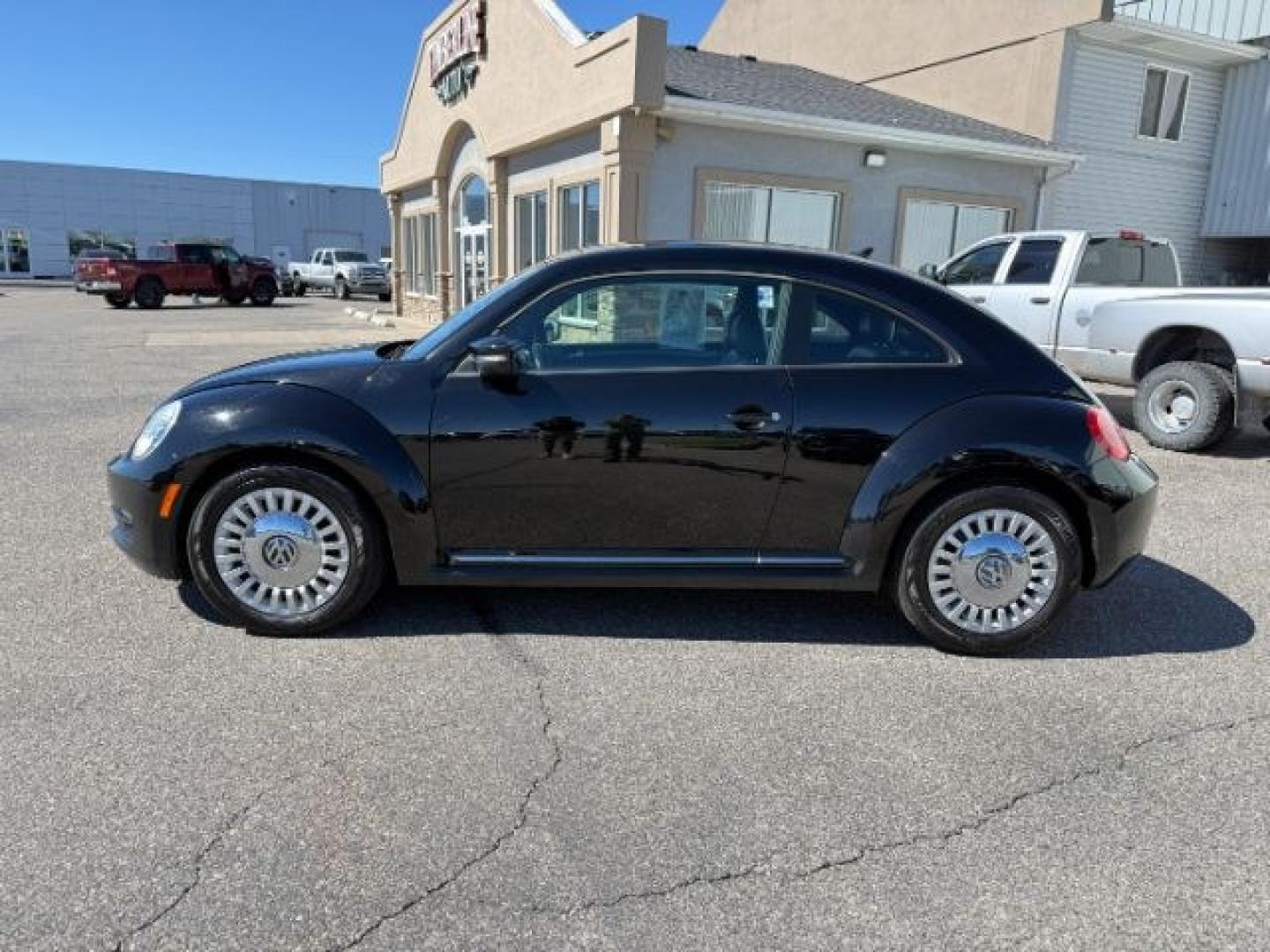 2014 BLACK /Titan Black Volkswagen Beetle (3VWJX7AT9EM) with an 25L I-5 DOHC engine, Automatic transmission, located at 1175 N Woodruff Ave, Idaho Falls, ID, 83401, 43.506901, -111.999657- Photo#23