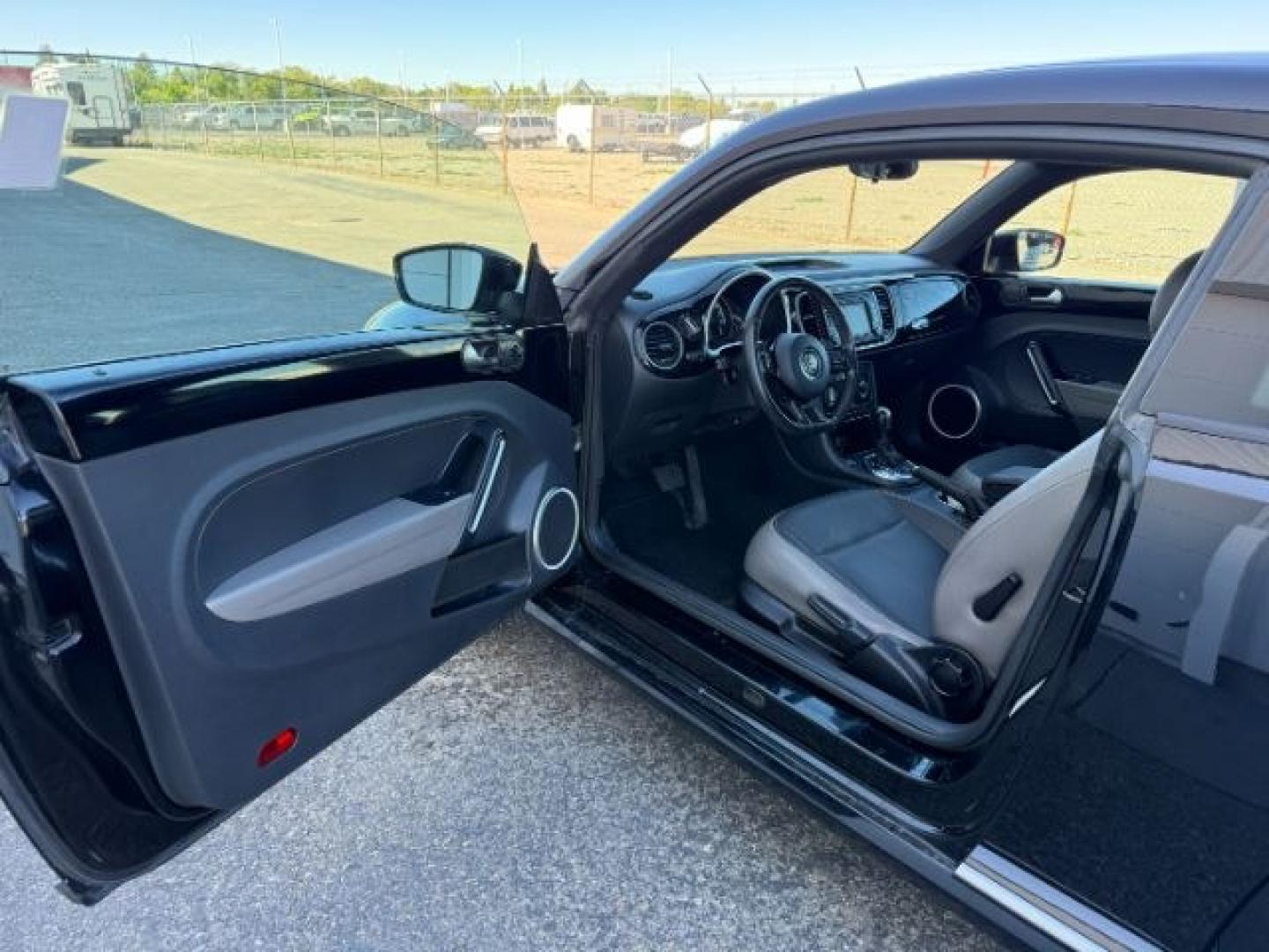 2014 BLACK /Titan Black Volkswagen Beetle (3VWJX7AT9EM) with an 25L I-5 DOHC engine, Automatic transmission, located at 1175 N Woodruff Ave, Idaho Falls, ID, 83401, 43.506901, -111.999657- Photo#33