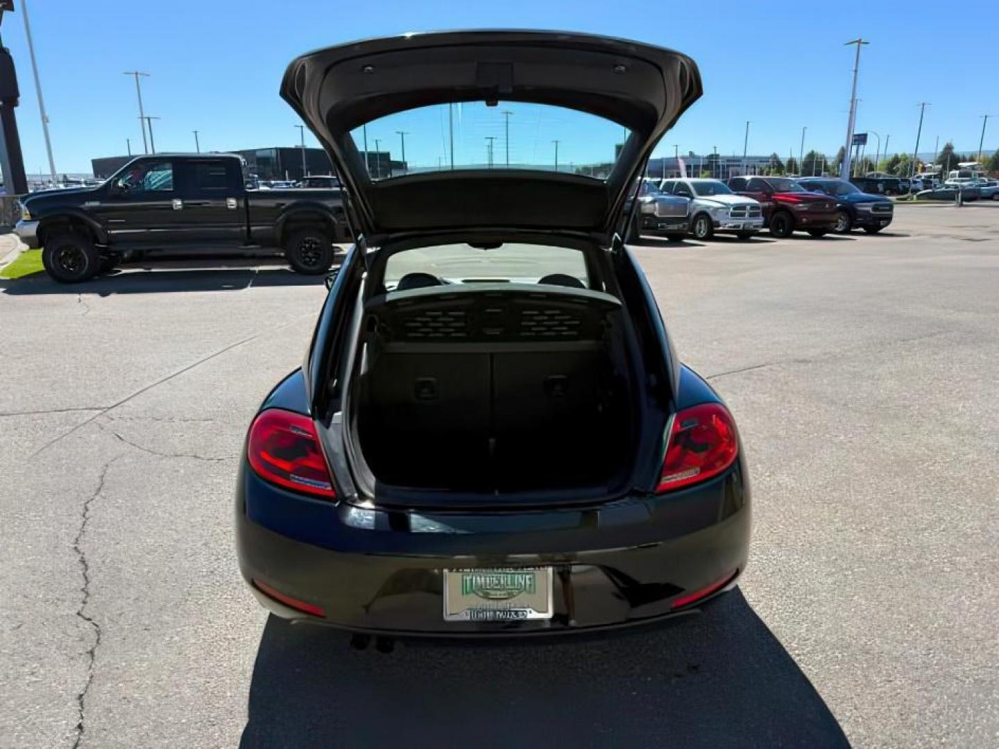 2014 BLACK /Titan Black Volkswagen Beetle (3VWJX7AT9EM) with an 25L I-5 DOHC engine, Automatic transmission, located at 1175 N Woodruff Ave, Idaho Falls, ID, 83401, 43.506901, -111.999657- Photo#4