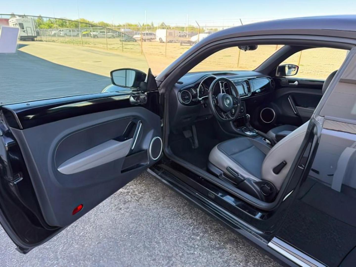 2014 BLACK /Titan Black Volkswagen Beetle (3VWJX7AT9EM) with an 25L I-5 DOHC engine, Automatic transmission, located at 1175 N Woodruff Ave, Idaho Falls, ID, 83401, 43.506901, -111.999657- Photo#11