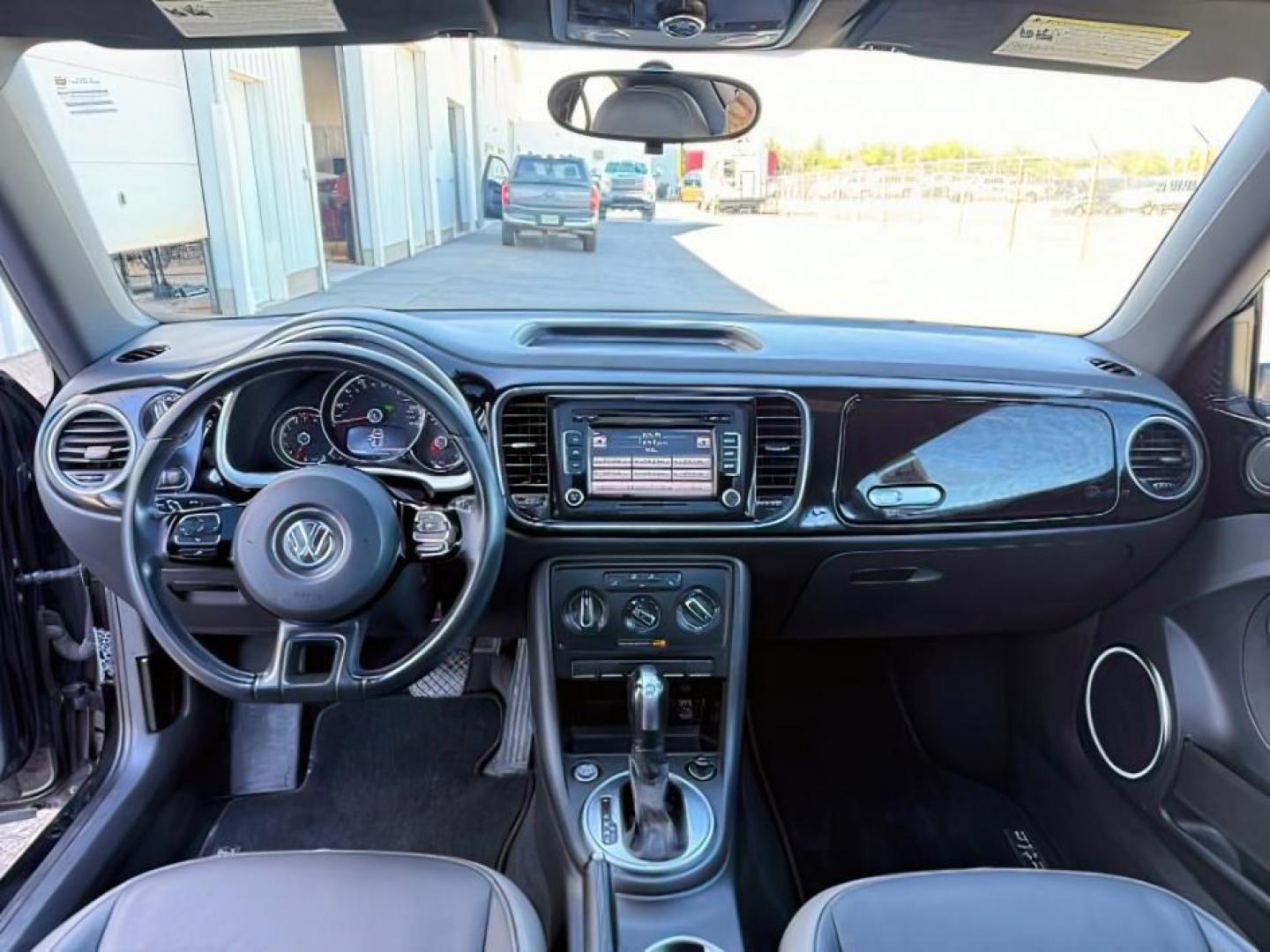 2014 BLACK /Titan Black Volkswagen Beetle (3VWJX7AT9EM) with an 25L I-5 DOHC engine, Automatic transmission, located at 1175 N Woodruff Ave, Idaho Falls, ID, 83401, 43.506901, -111.999657- Photo#20