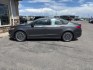 2017 GRAY /Ebony Ford Fusion (3FA6P0K90HR) with an EcoBoost 2L I-4 gasoline direct injection engine, Automatic transmission, located at 1175 N Woodruff Ave, Idaho Falls, ID, 83401, 43.506901, -111.999657 - At Timberline Auto, finding a great deal on your next vehicle is always easy! Our experienced sales staff goal is to help find you the right vehicle at the right price! Our knowledgeable finance department has options for almost any credit score. We offer extended service contract options to prot - Photo#1