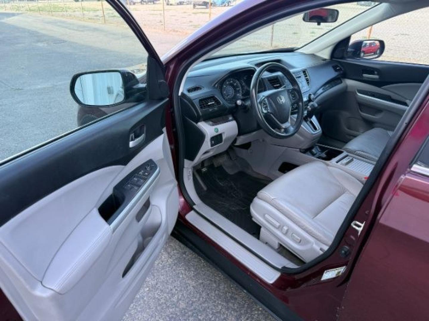 2013 MAROON /Black Honda CR-V (5J6RM4H79DL) with an 24L I-4 DOHC engine, Automatic transmission, located at 1175 N Woodruff Ave, Idaho Falls, ID, 83401, 43.506901, -111.999657 - At Timberline Auto, finding a great deal on your next vehicle is always easy! Our experienced sales staff goal is to help find you the right vehicle at the right price! Our knowledgeable finance department has options for almost any credit score. We offer extended service contract options to prot- Photo#41