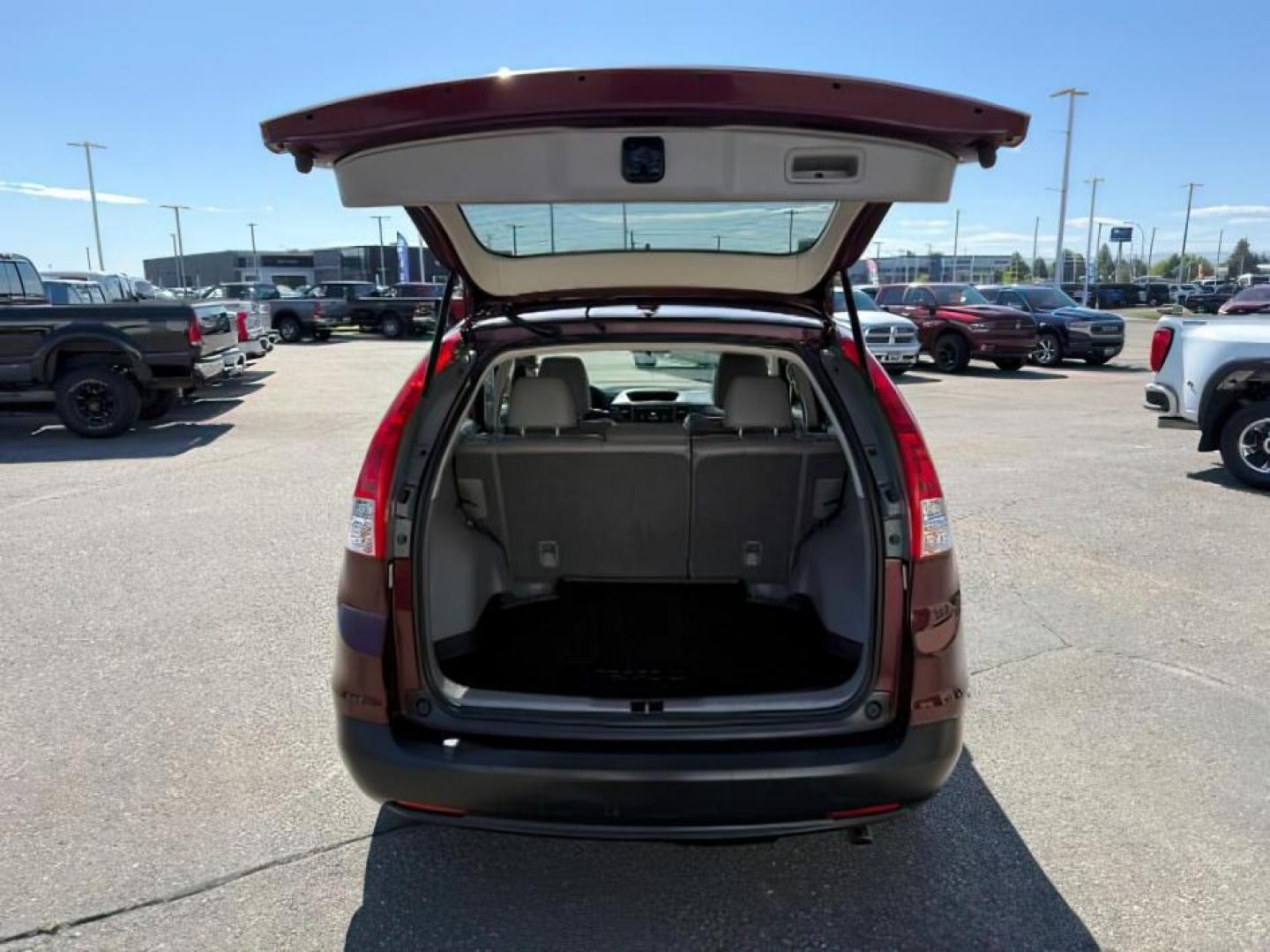 2013 MAROON /Black Honda CR-V (5J6RM4H79DL) with an 24L I-4 DOHC engine, Automatic transmission, located at 1175 N Woodruff Ave, Idaho Falls, ID, 83401, 43.506901, -111.999657 - At Timberline Auto, finding a great deal on your next vehicle is always easy! Our experienced sales staff goal is to help find you the right vehicle at the right price! Our knowledgeable finance department has options for almost any credit score. We offer extended service contract options to prot- Photo#5