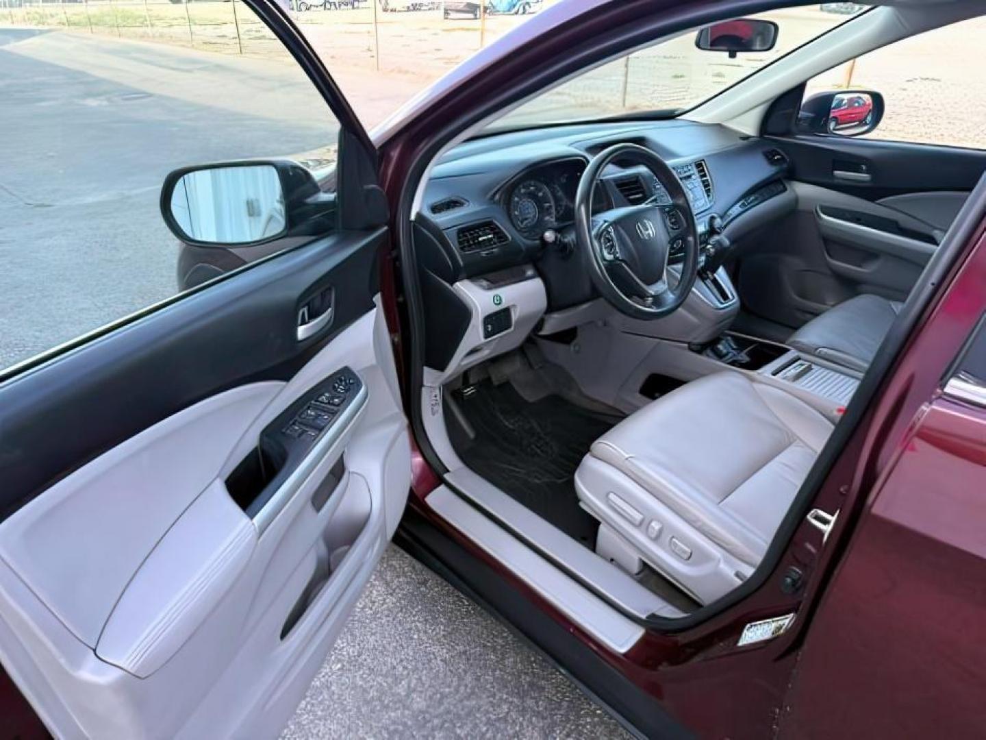 2013 MAROON /Black Honda CR-V (5J6RM4H79DL) with an 24L I-4 DOHC engine, Automatic transmission, located at 1175 N Woodruff Ave, Idaho Falls, ID, 83401, 43.506901, -111.999657 - At Timberline Auto, finding a great deal on your next vehicle is always easy! Our experienced sales staff goal is to help find you the right vehicle at the right price! Our knowledgeable finance department has options for almost any credit score. We offer extended service contract options to prot- Photo#13