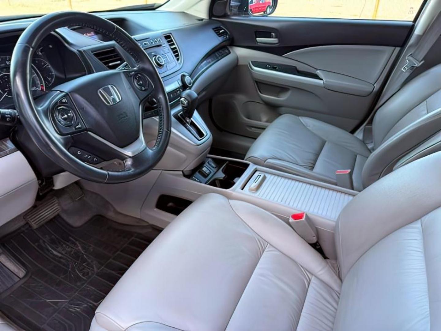 2013 MAROON /Black Honda CR-V (5J6RM4H79DL) with an 24L I-4 DOHC engine, Automatic transmission, located at 1175 N Woodruff Ave, Idaho Falls, ID, 83401, 43.506901, -111.999657 - At Timberline Auto, finding a great deal on your next vehicle is always easy! Our experienced sales staff goal is to help find you the right vehicle at the right price! Our knowledgeable finance department has options for almost any credit score. We offer extended service contract options to prot- Photo#15